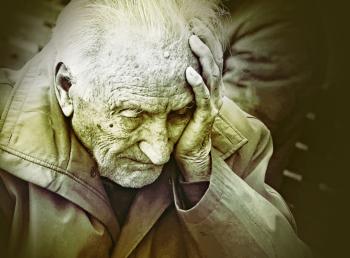 Emotional Colorized Portrait of Elderly Man Worrying