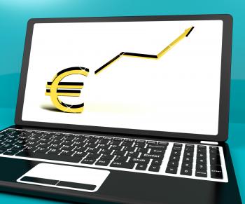 Euro Sign And Up Arrow On Computer For Earnings Or Profit