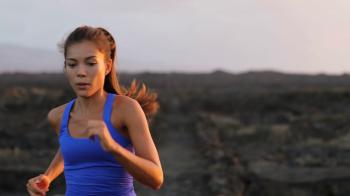 Asian woman runner running cross country trail run. Female jogger ...
