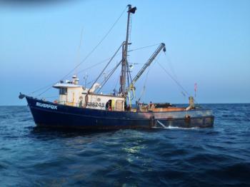 Coast Guard rescues crews from 2 sinking fishing boats off ...