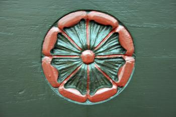 Flowery icon carved into a church door