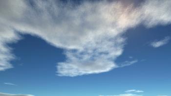 obClouds fly on the sky. White clouds flying across a blue sky ...