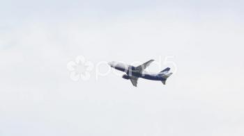 The airplane is flying in cloudy sky in Adler, Sochi ~ Footage #53234368
