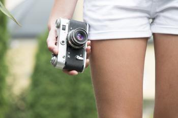 Girl with retro camera