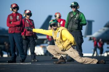 File:Catapult officer on USS Harry S. Truman (CVN-75) giving launch ...