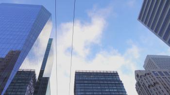 Big modern city with tall glassy skyscrapers and office buildings ...