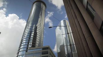 sky view of chrome and glass skyscraper office buildings houston 4k ...