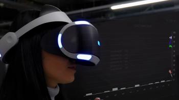 A young woman with virtual reality glasses and a futuristic ...