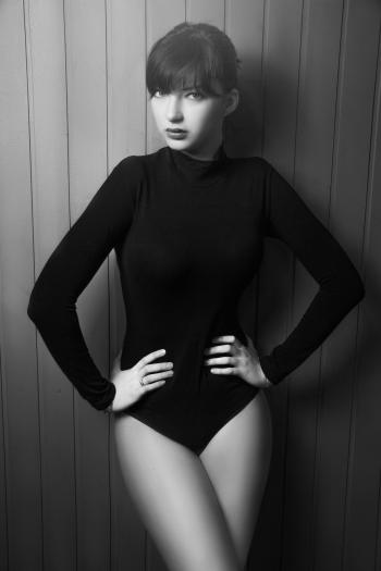 Gray Scale Photo of Woman in Long Sleeves Leotard