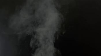 Smoke gray on black short. Grey clouds of smoke from burning dry ...