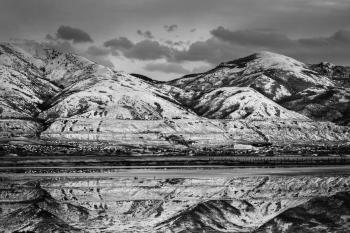 Grayscale Photo of a Landscape View of Mountains