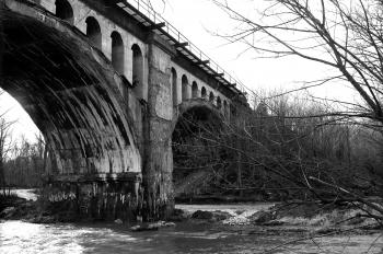 Grayscale Photo Of Bridge