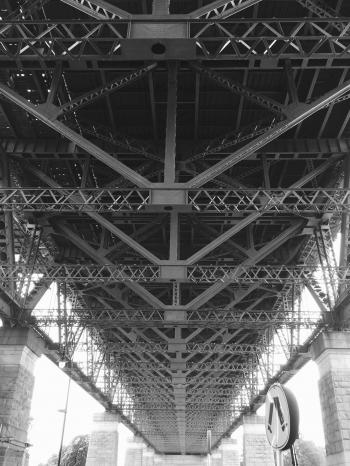 Grayscale Photo of Bridge Frame