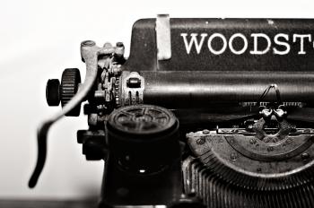 Grayscale Photo of Typewriter