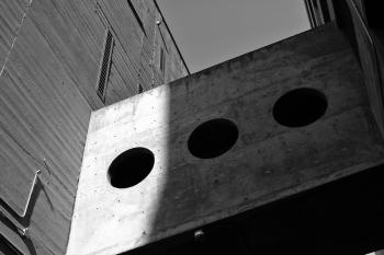 Grayscale Photography of Board With Three Round Holes