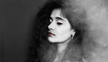 Grayscale Photography of Woman With Red Lipstick Wearing Hoop Earrings