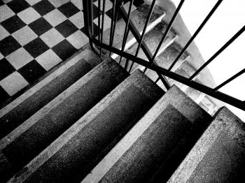 Grey Scale Photo of Stairs
