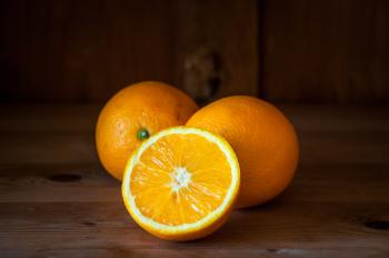 Group of three fresh oranges