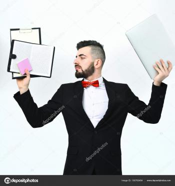Project manager having busy look holds clip folders with paper ...