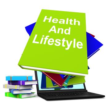 Health and Lifestyle Book Stack Laptop Shows Healthy Living