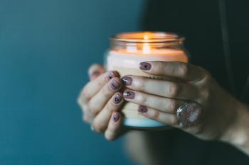 Holding a Candle
