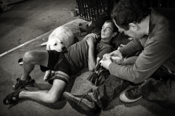 Homeless men with dog
