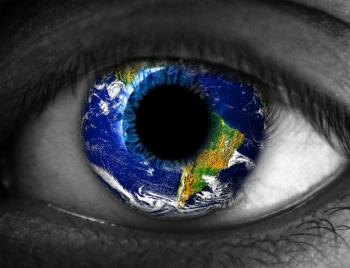 Human eye with planet Earth
