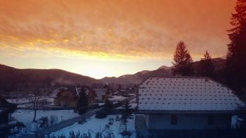 Winter morning sunrise in mountain village, time lapse footage of ...