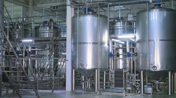 Chemical Plant. Shiny stainless steel storages, pipeline at a modern ...