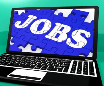 Jobs Puzzle On Notebook Shows Online Applications