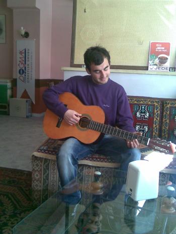 Kerim playing the guitar