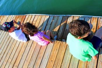 Kids talking on the pier