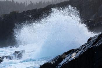 Large waves crashing on shoreline