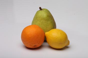 Lemon, Pear and Orange isolated on white