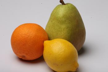 Lemon, Pear and Orange isolated on white