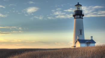 Yaquina Head Lighthouse As The Sun Goes Down