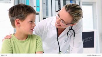 Doctor Talking With Little Boy Stock video footage | 4440118
