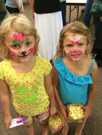 Two Little Girls after Visiting Honeysuckle the Clown