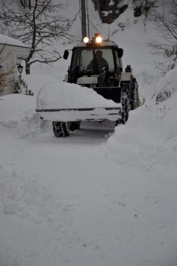 Loader clearing the snow