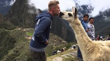 Kissing a llama at Machu Picchu, Peru - YouTube