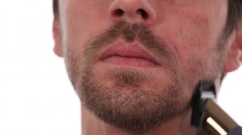 Mature Man Trimming Beard Using Electric Trimmer Shave Hair Close Up ...