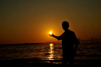 Man Holding Sun : Public Domain Pictures
