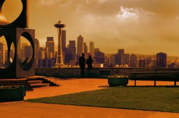 Man and Woman Looking at Space Needle Photo