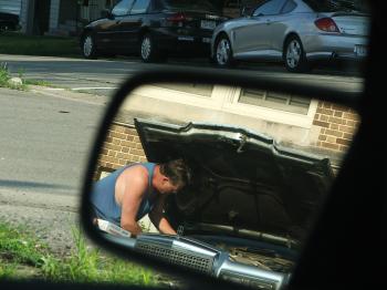 Man fixing Car