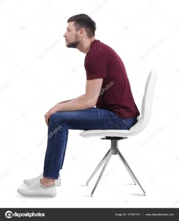 Man sitting on chair — Stock Photo © belchonock #147547151