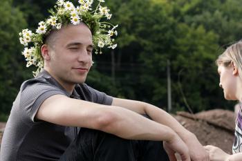 Man with flower crown