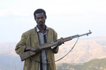 File:Flickr - don macauley - Man with a gun 2.jpg - Wikimedia Commons