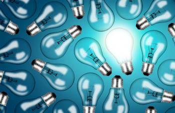 Many Lightbulbs on Blue Background - Ideas and Creativity Concept
