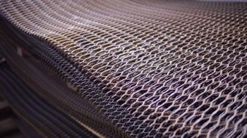 Stacked heavy rusty metal wire grid on a construction site Stock ...