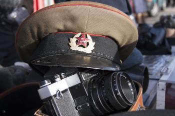Military Cap and Old Camera